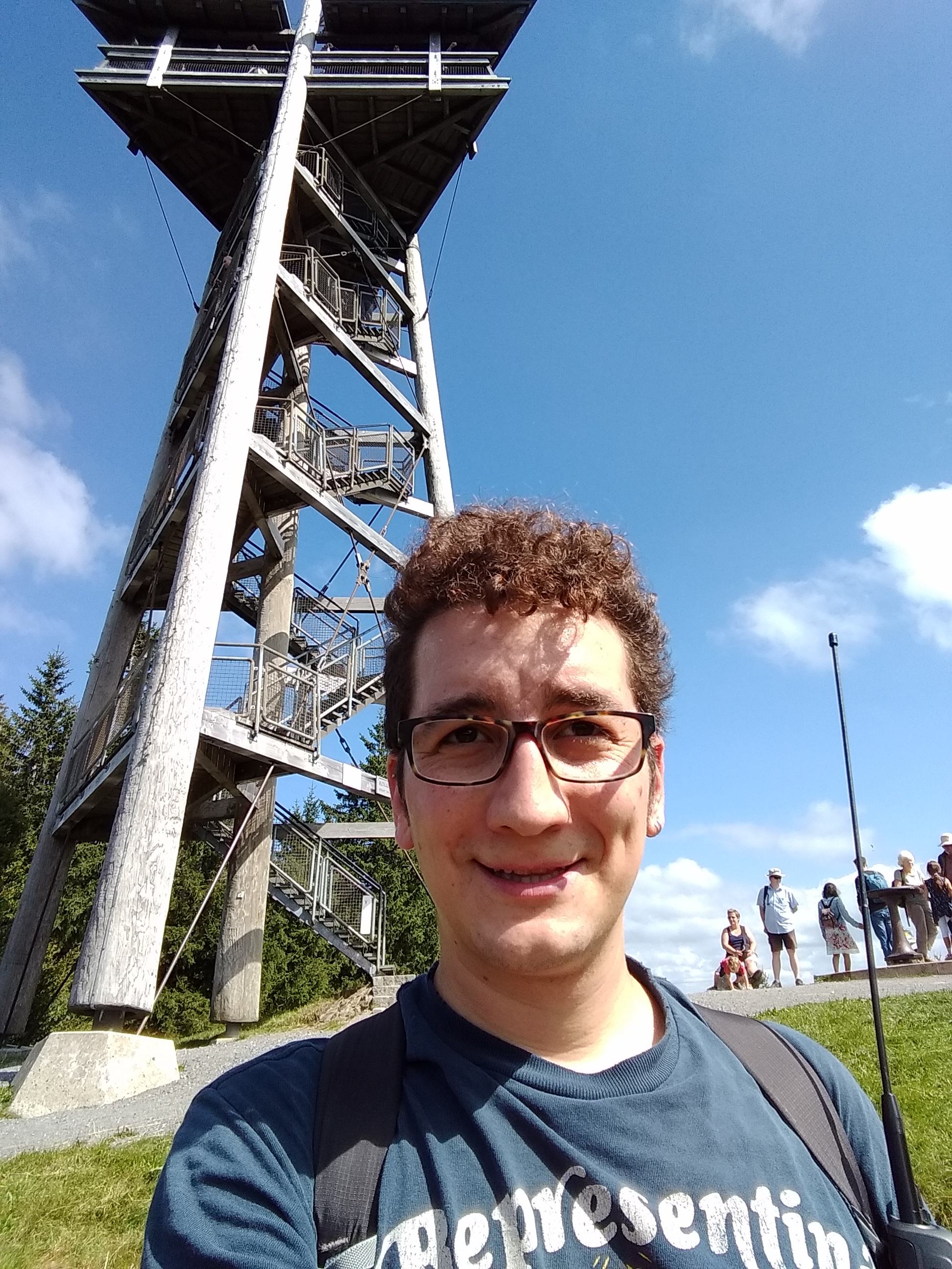 Selfie on Schauinsland with the observation tower visible in the background.